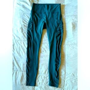 Fabletics Powerhold blue leggings with mesh and side pockets adult small